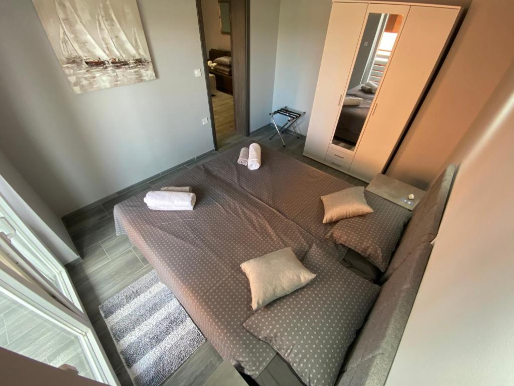 Postel nebo postele na pokoji v ubytování Villa Maleo