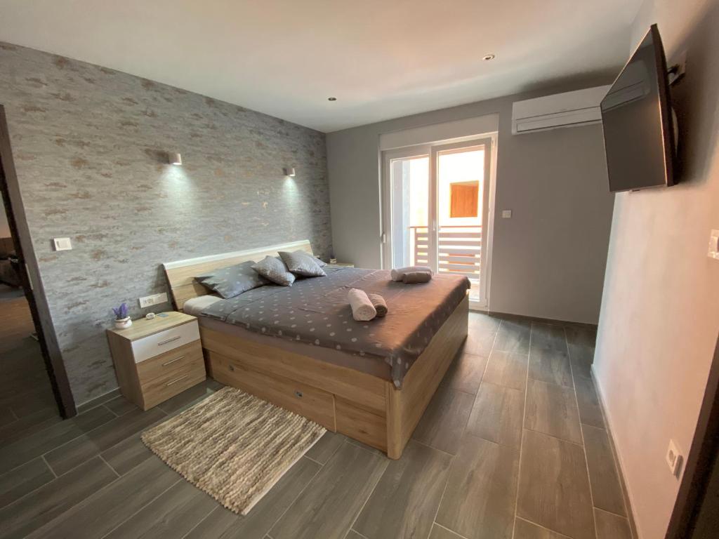Postel nebo postele na pokoji v ubytování Villa Maleo