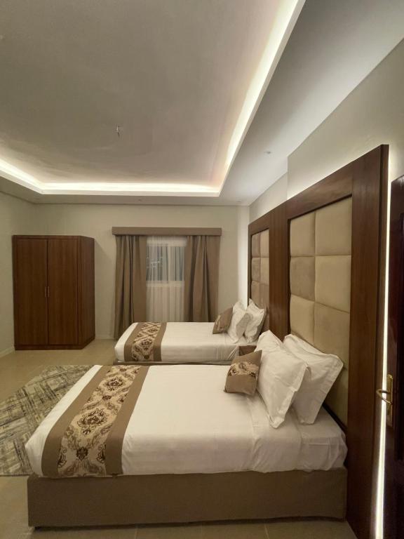Rawaes Hotel - Two-Bedroom Suite
