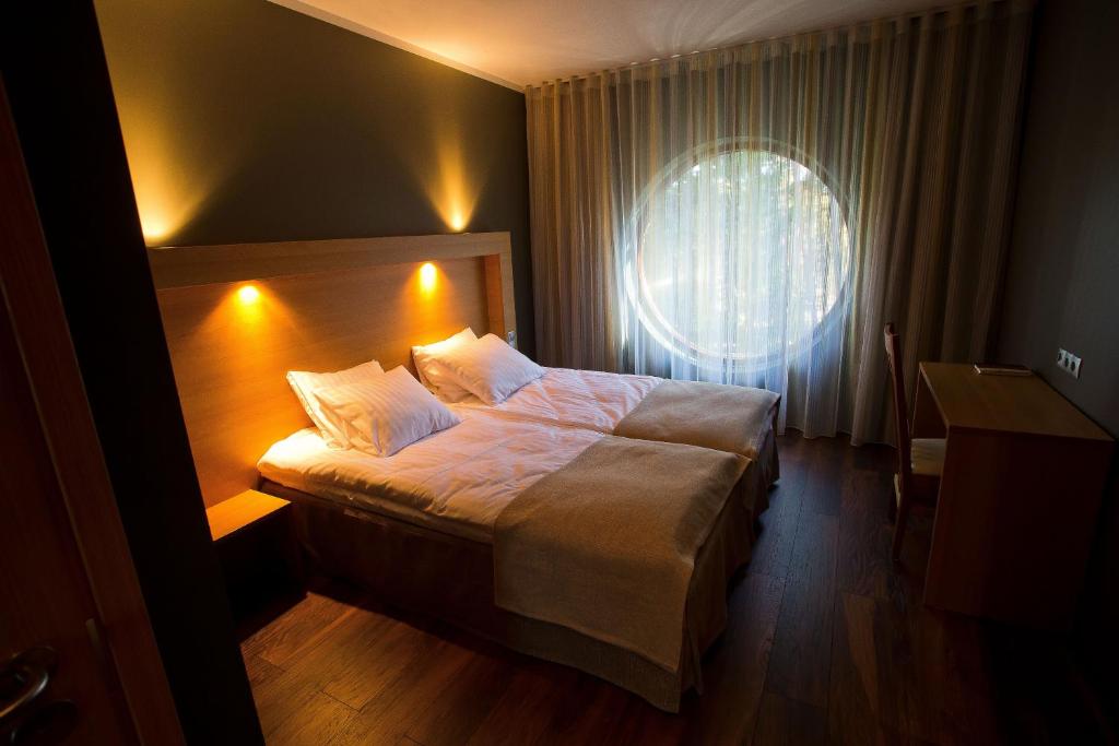 Postel nebo postele na pokoji v ubytování Dirhami Guesthouse