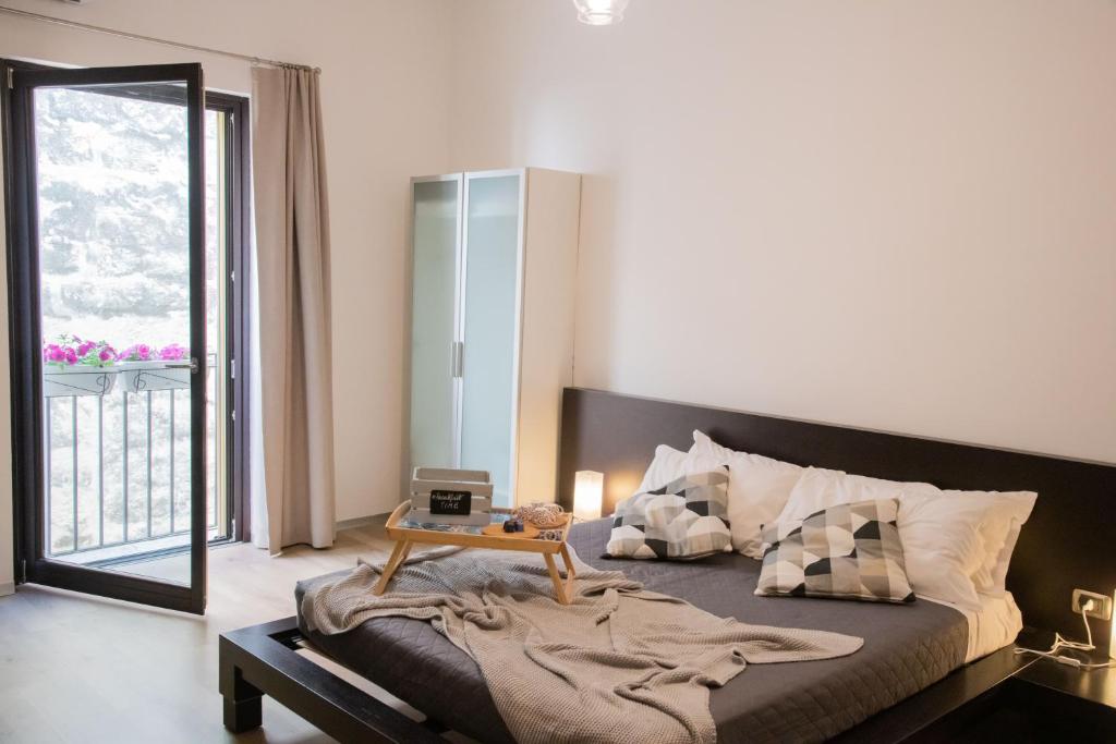 Postel nebo postele na pokoji v ubytování La Giudecca Trani