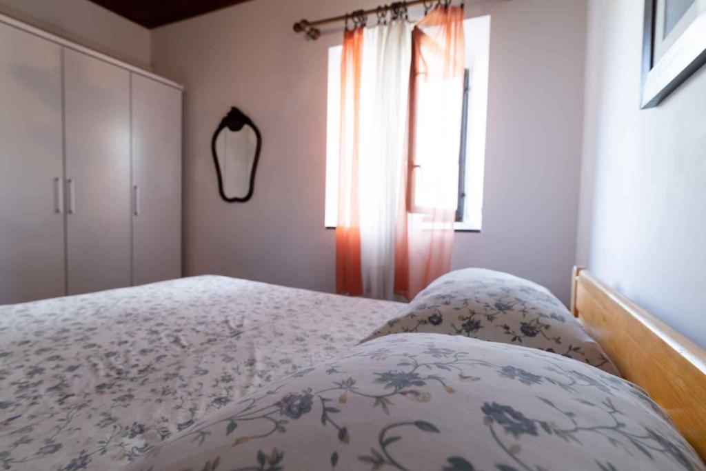 Posteľ alebo postele v izbe v ubytovaní Apartment Kukljica 5