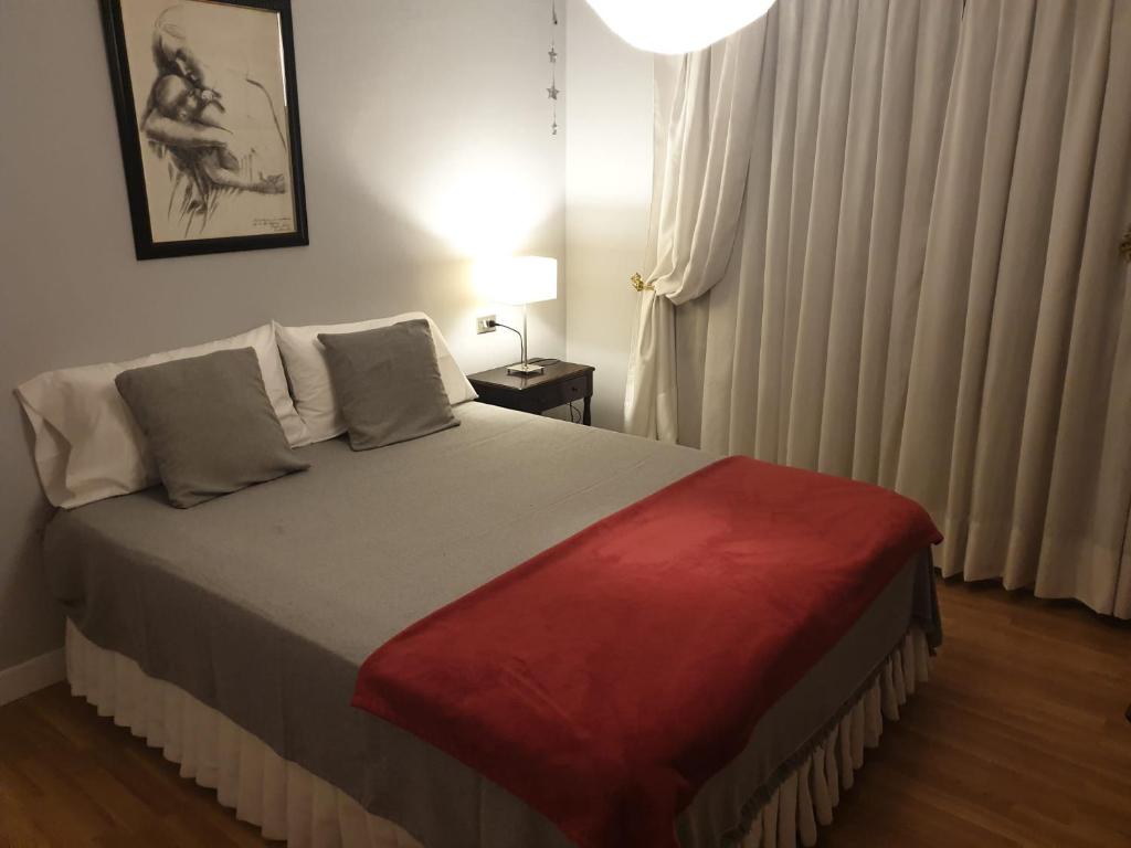 Postel nebo postele na pokoji v ubytování Apartamento Velázquez Moreno