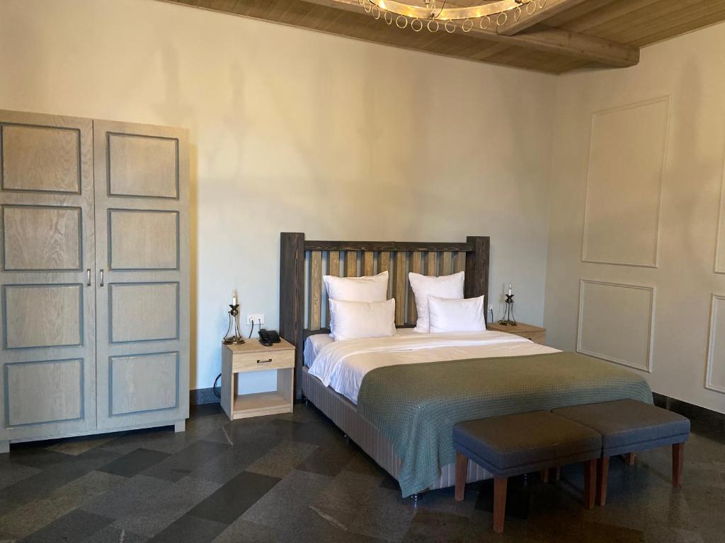 Postel nebo postele na pokoji v ubytování Apricot Hotel Yerevan