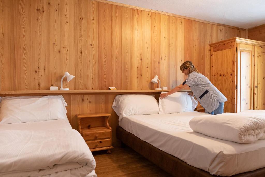 Postel nebo postele na pokoji v ubytování Hotel Meuble' Joli