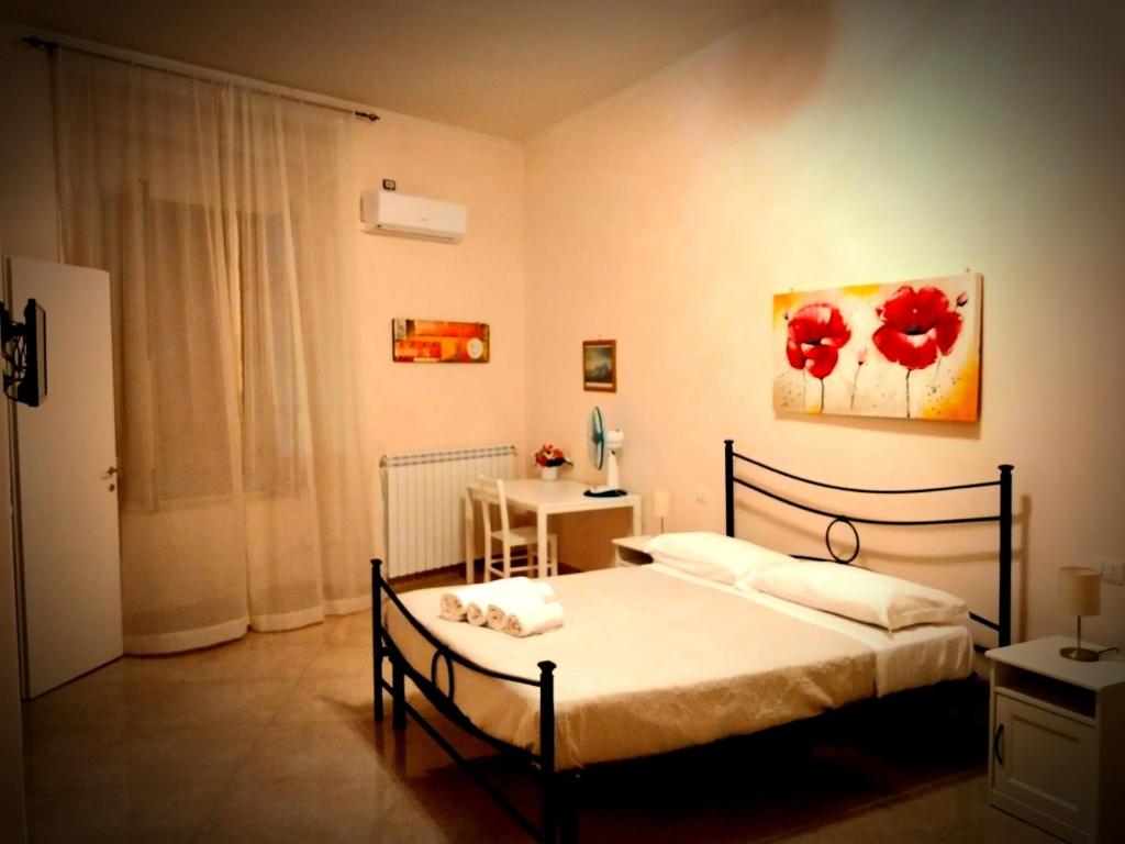Łóżko lub łóżka w pokoju w obiekcie Domusrealstella