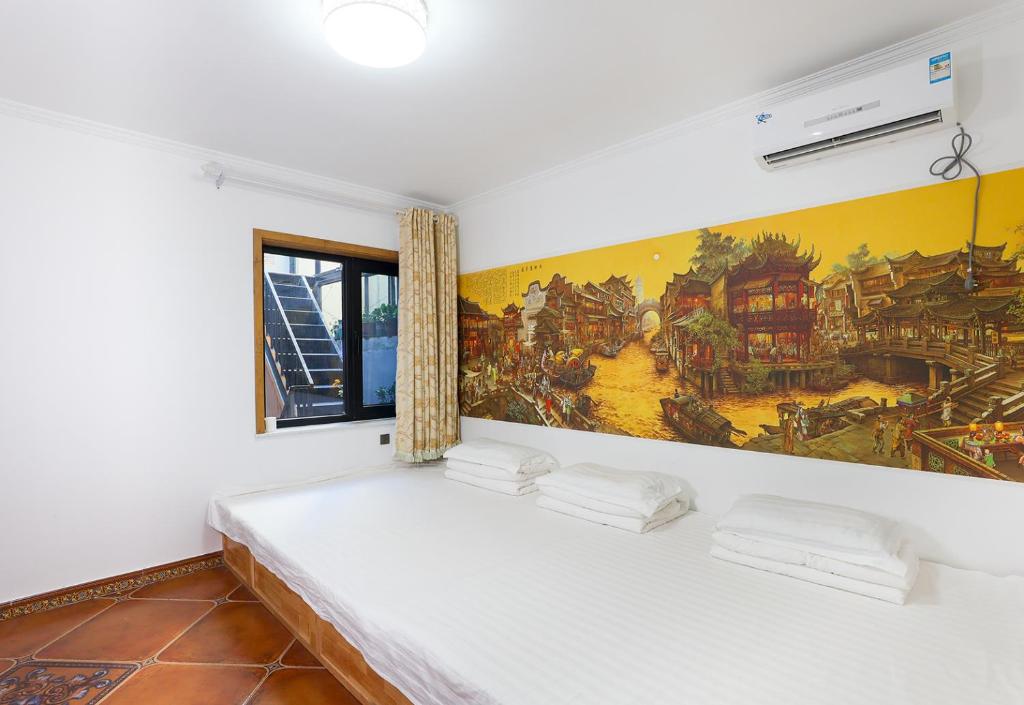 Letto o letti in una camera di Beijing Mutianyu Great Wall Wangshanyuan Homestay