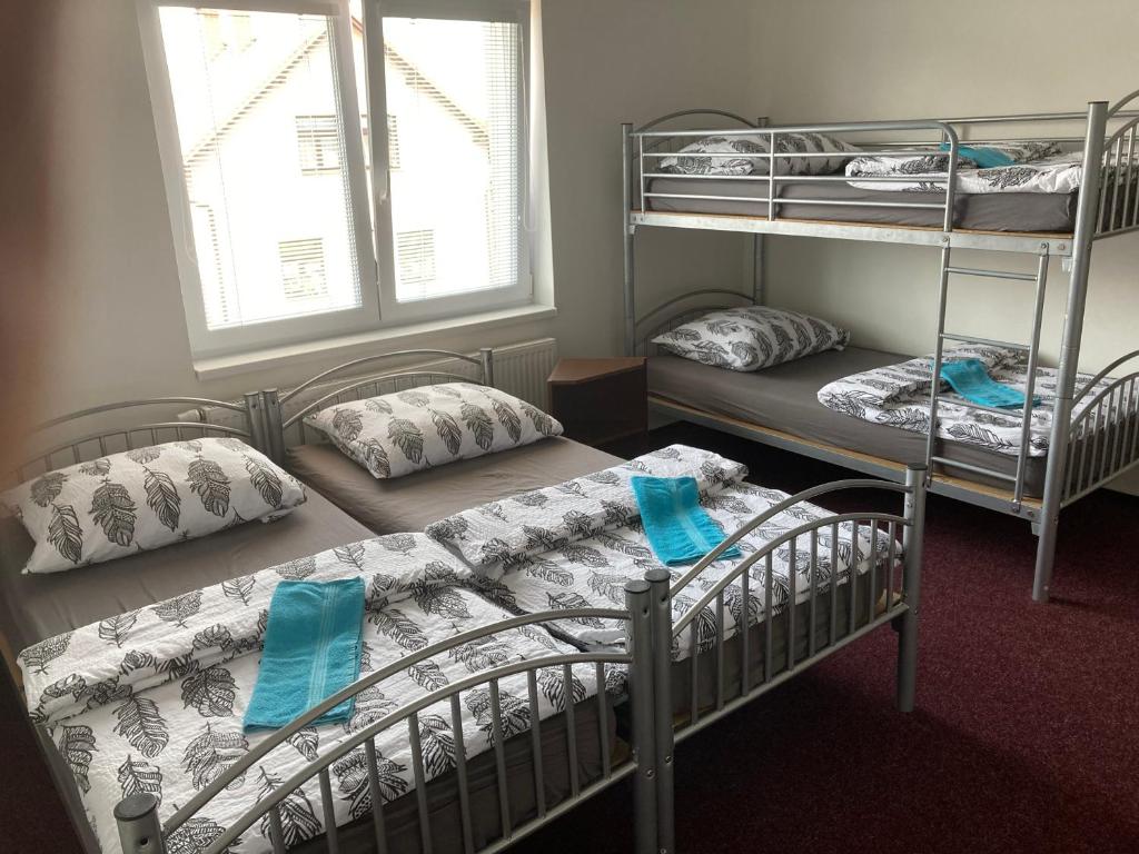 Postel nebo postele na pokoji v ubytování Apartmány V ráji