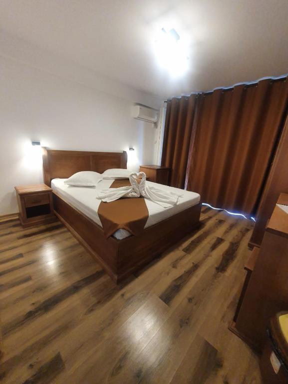 Postel nebo postele na pokoji v ubytování Casa Vlad