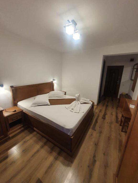 Postel nebo postele na pokoji v ubytování Casa Vlad