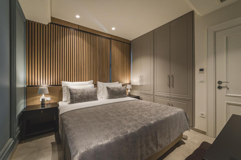 Ένα ή περισσότερα κρεβάτια σε δωμάτιο στο Kalamper Apartments