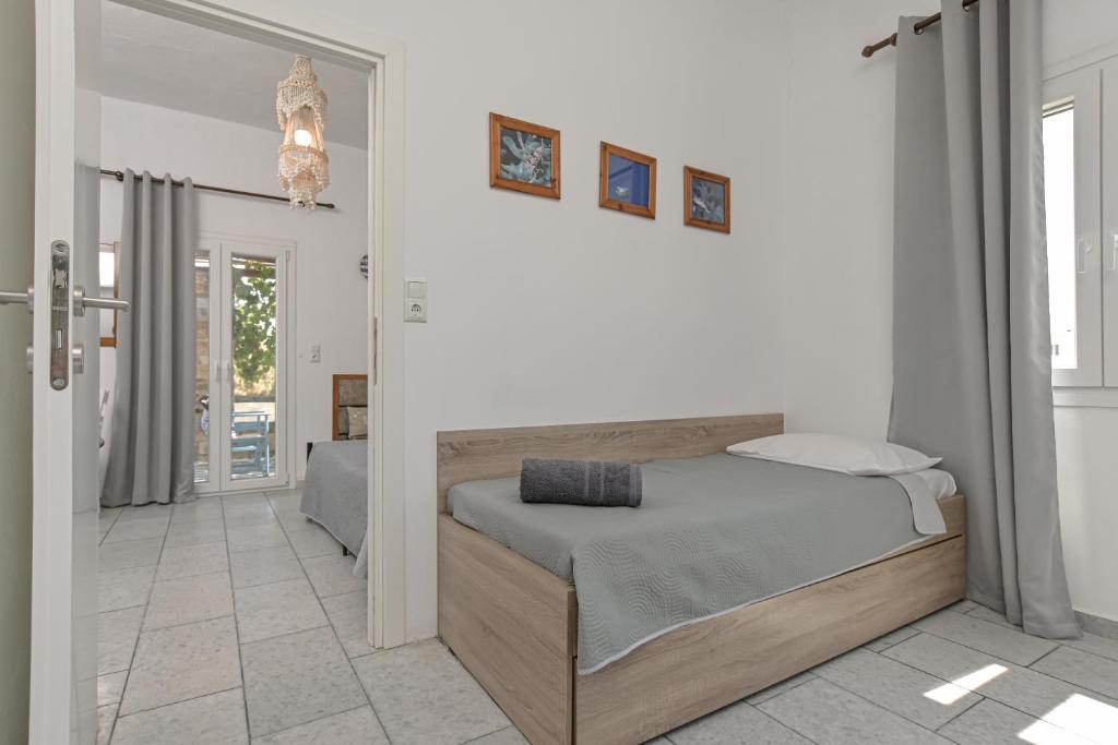 Postel nebo postele na pokoji v ubytování Studios Vythos