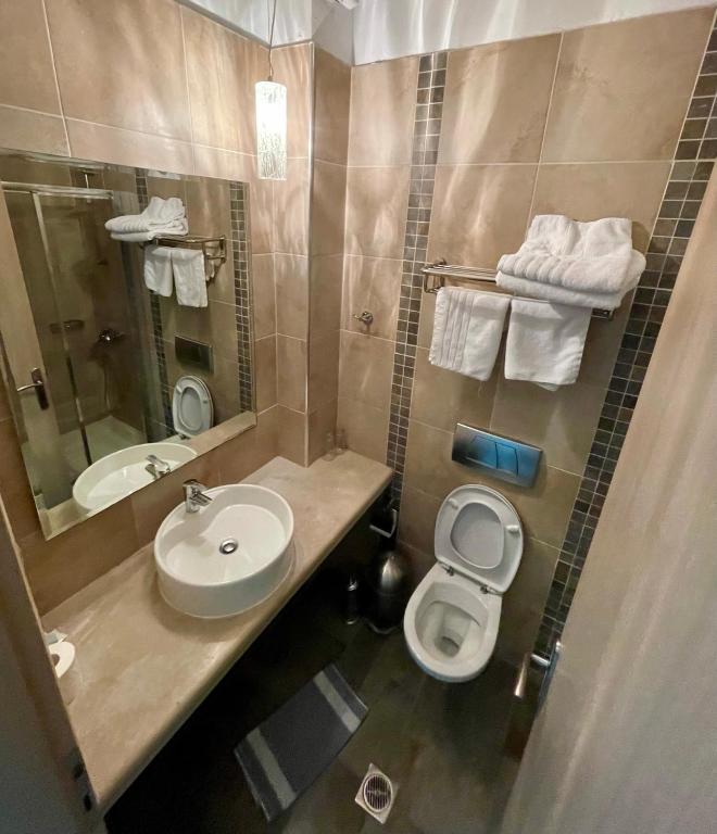 Koupelna v ubytování Hotel Afrodite