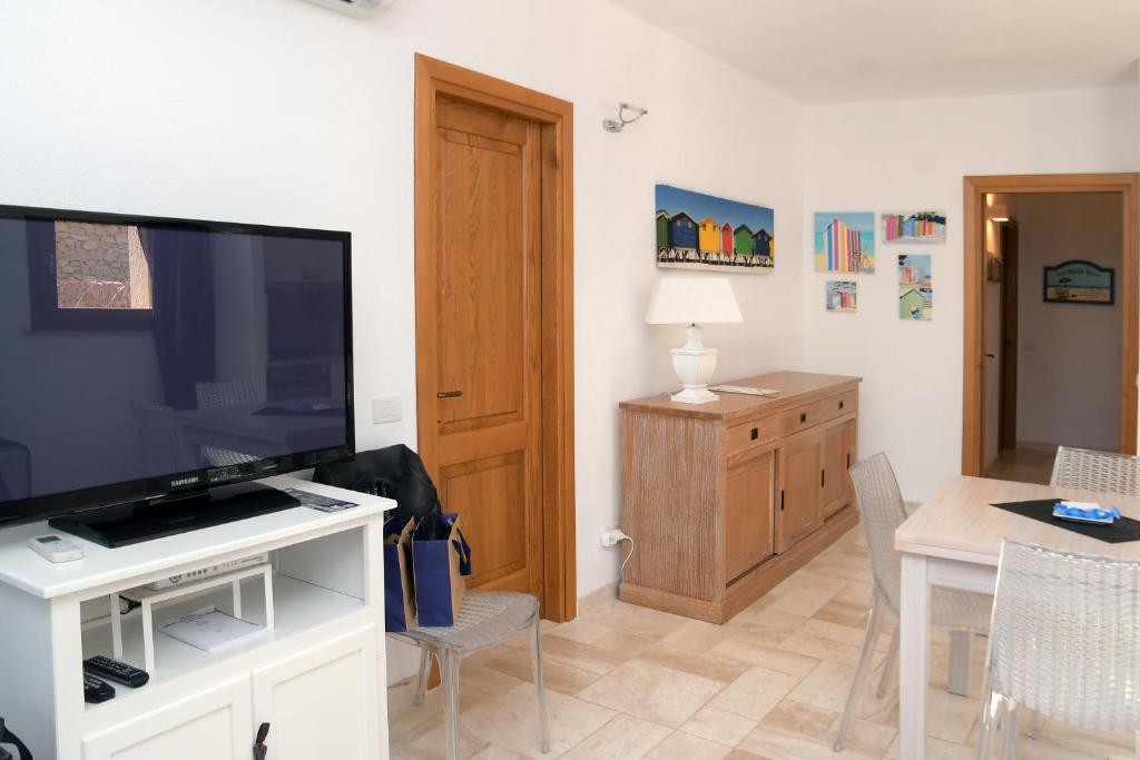 TV a/nebo společenská místnost v ubytování Dolce Vita Boutique Hotel