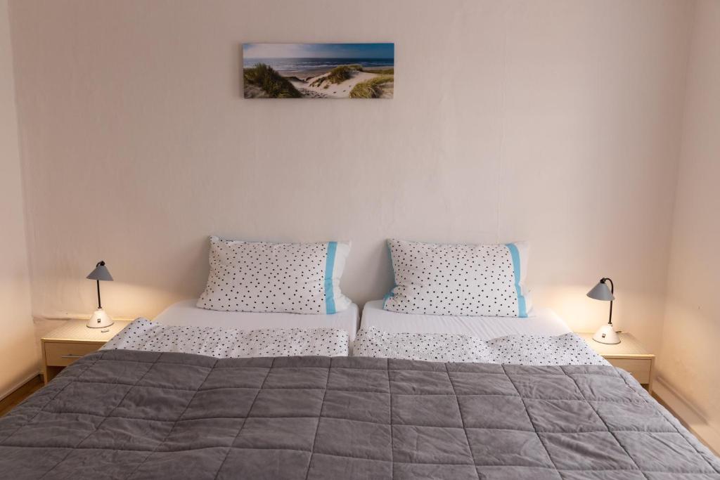 Postel nebo postele na pokoji v ubytování Hotel zur Post Ochsendorf