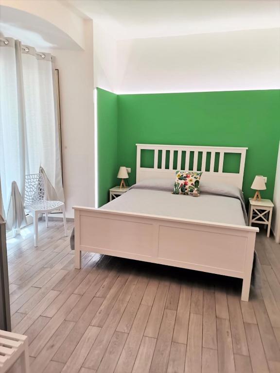 Postel nebo postele na pokoji v ubytování DG Sicily