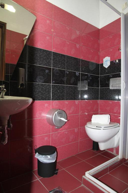 Koupelna v ubytování Hotel Selini