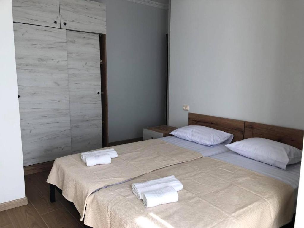 Voodi või voodid majutusasutuse Chaki Hotel toas