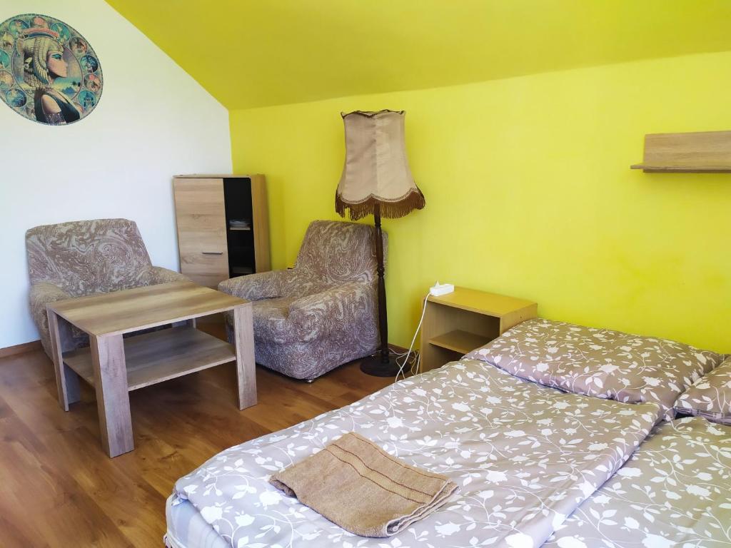 Łóżko lub łóżka w pokoju w obiekcie Penzion Renata