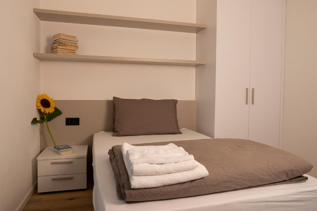 Posteľ alebo postele v izbe v ubytovaní SILVANELLO Apartment