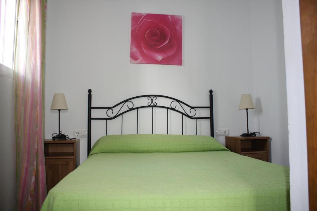 Postel nebo postele na pokoji v ubytování LA LAGUNA