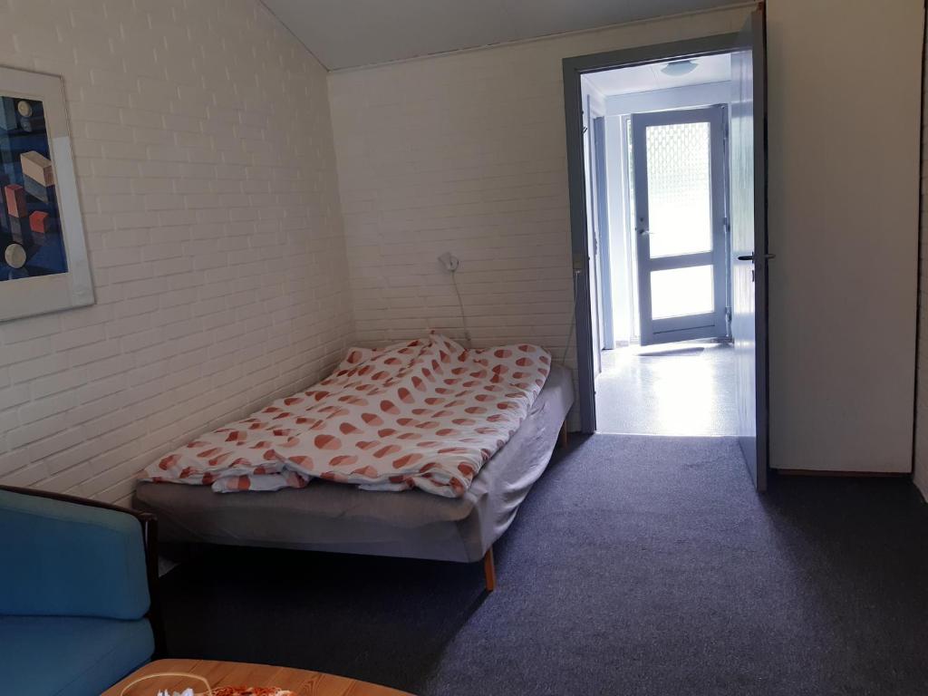 Postel nebo postele na pokoji v ubytování Rejkjær Camping Hytter & Lejligheder