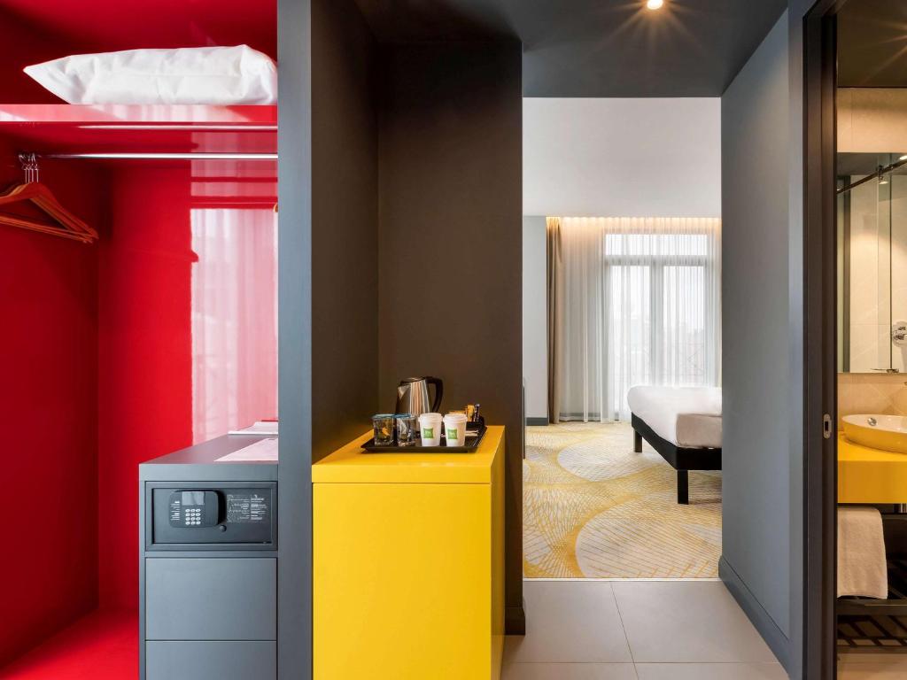 A bed or beds in a room at ibis Styles Istanbul Merter