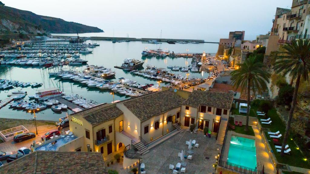 a view of a marina with boats in the water at Hotel Cetarium in Castellammare del Golfo