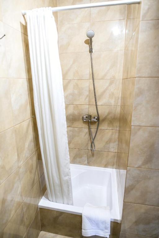 Kúpeľňa v ubytovaní Apartamenty Centrum Biskupiec