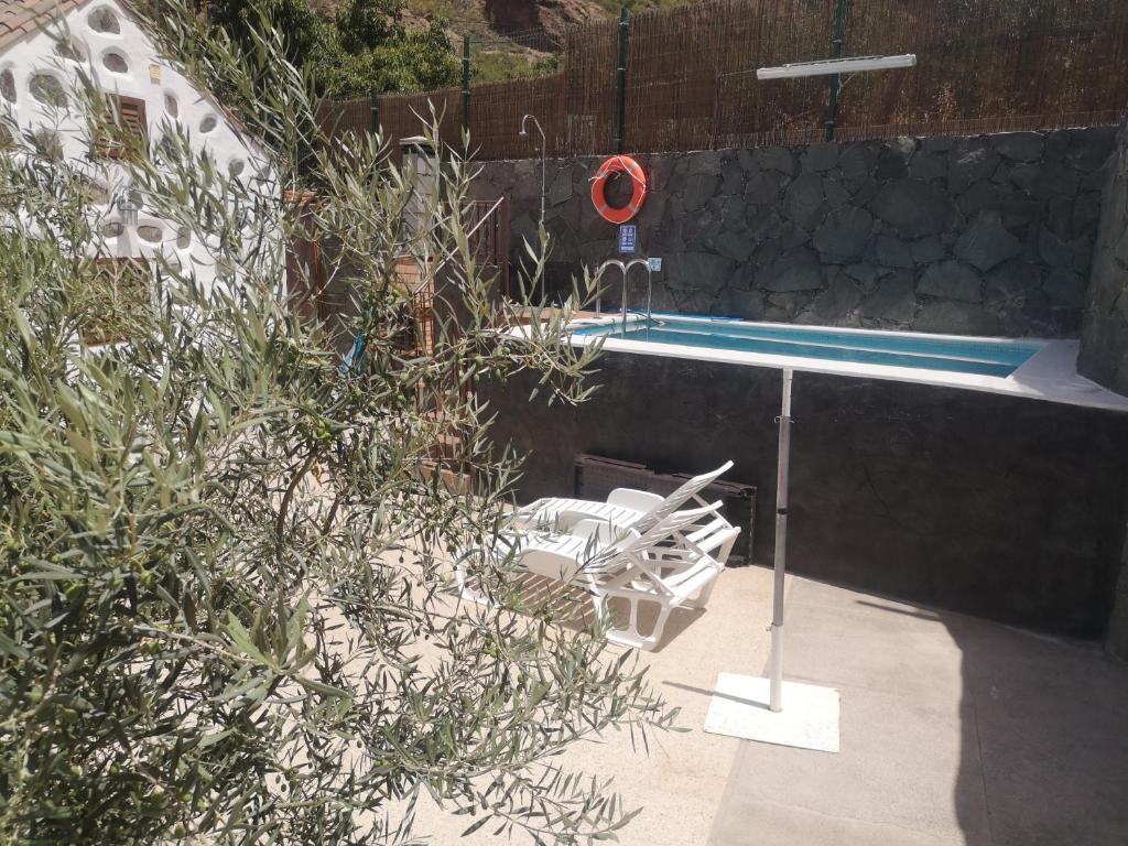 The swimming pool at or close to Casa Naranjo