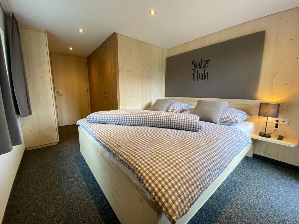 a bedroom with two beds in a room at Gasthaus Sulzfluh in Schruns