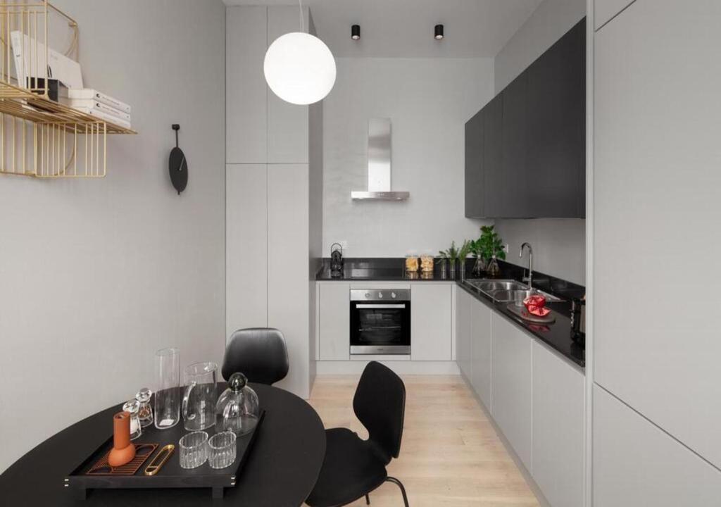 Kuchyňa alebo kuchynka v ubytovaní BB Hotels Aparthotel Collection Il Michelangelo