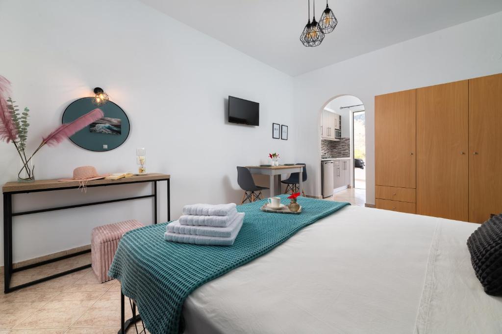 Postel nebo postele na pokoji v ubytování Althea Apartments