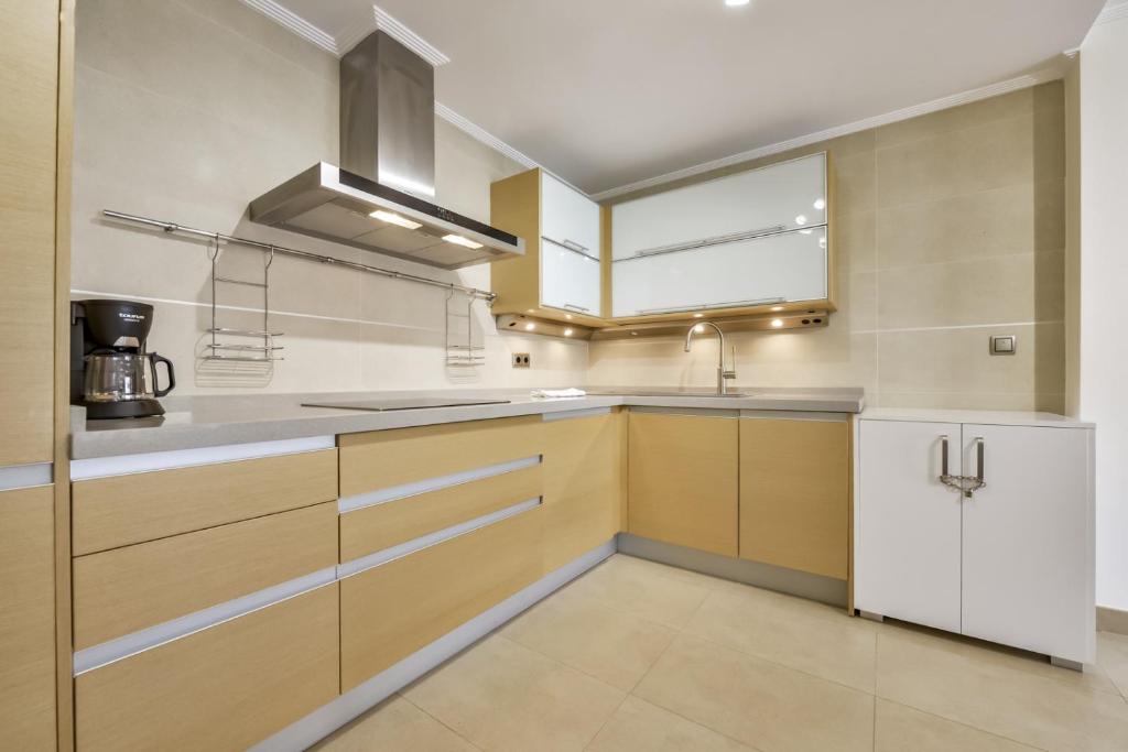 Kuchyň nebo kuchyňský kout v ubytování Villas Guzman - Marjaleta