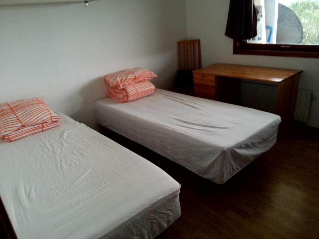 Postel nebo postele na pokoji v ubytování Gardenview Room