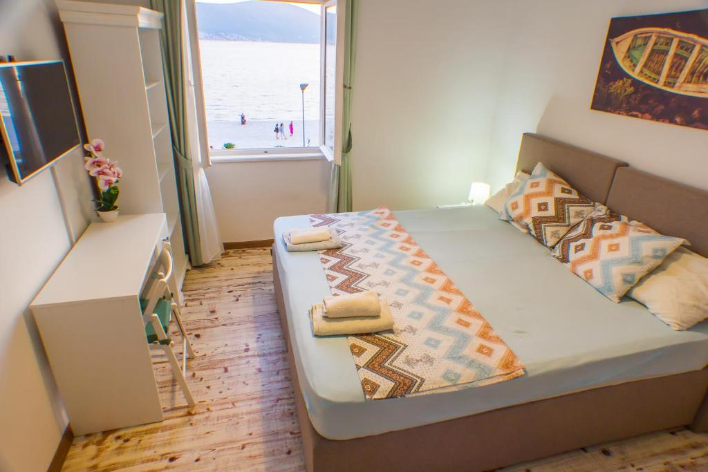 Postel nebo postele na pokoji v ubytování Riva Guesthouse