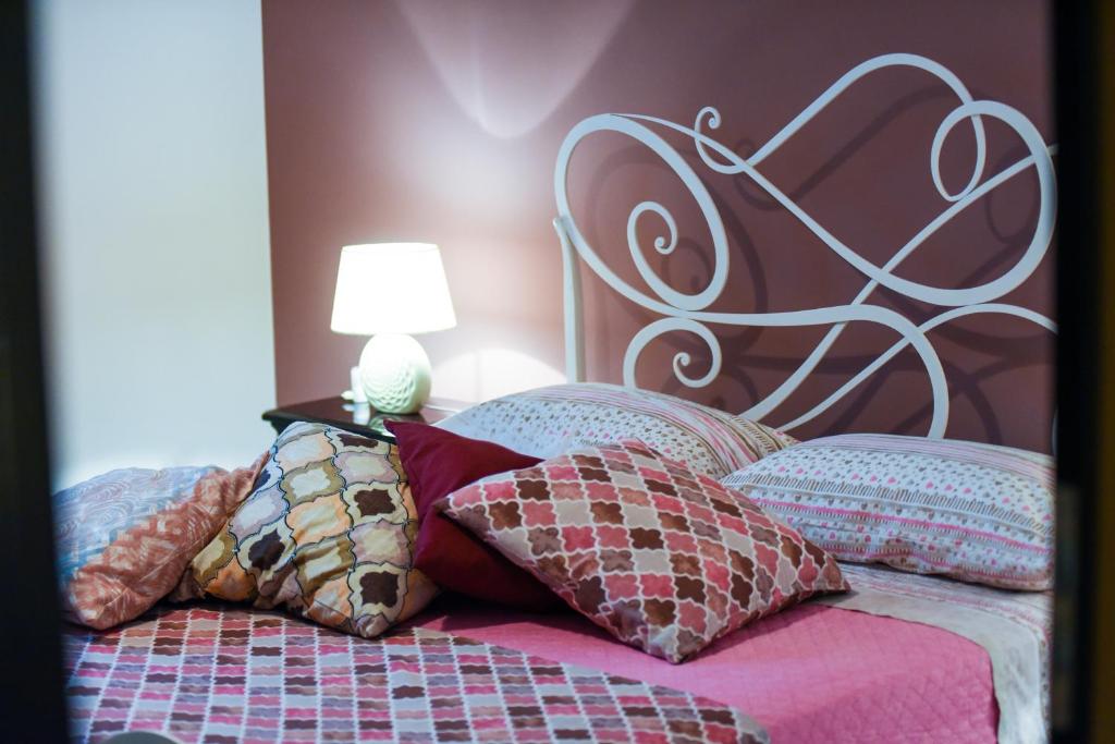 מיטה או מיטות בחדר ב-Casa Maria