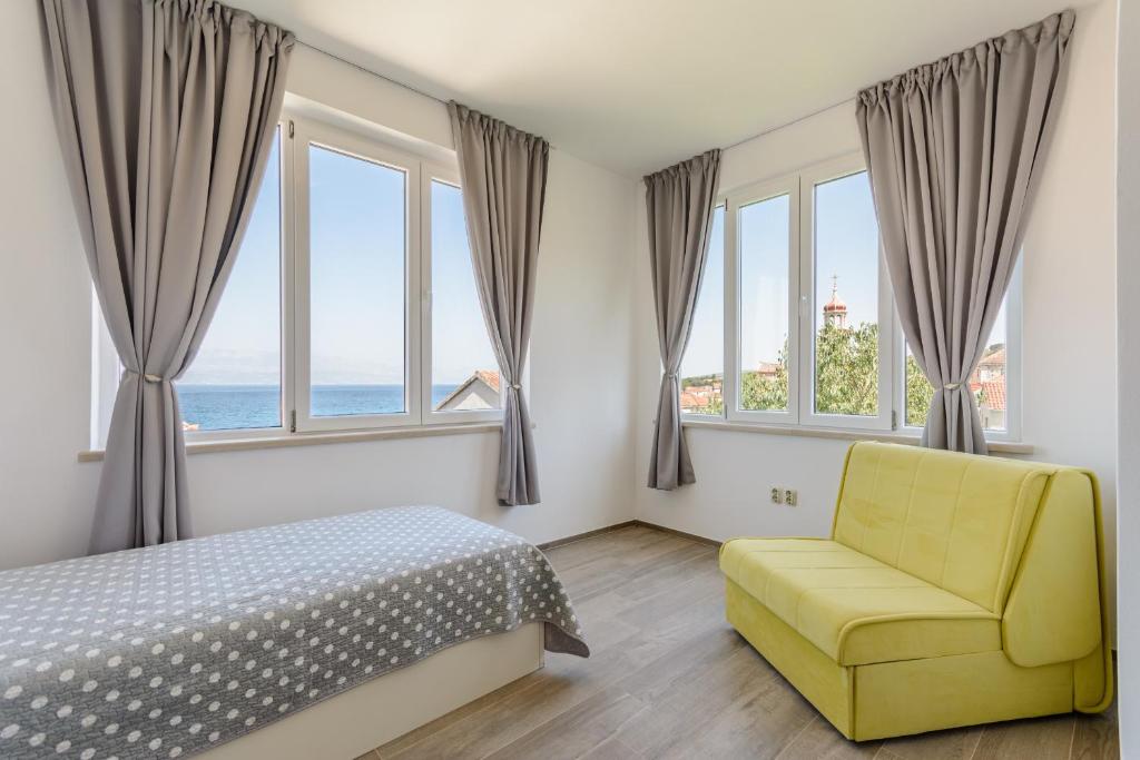 Postel nebo postele na pokoji v ubytování Apartment Marcela