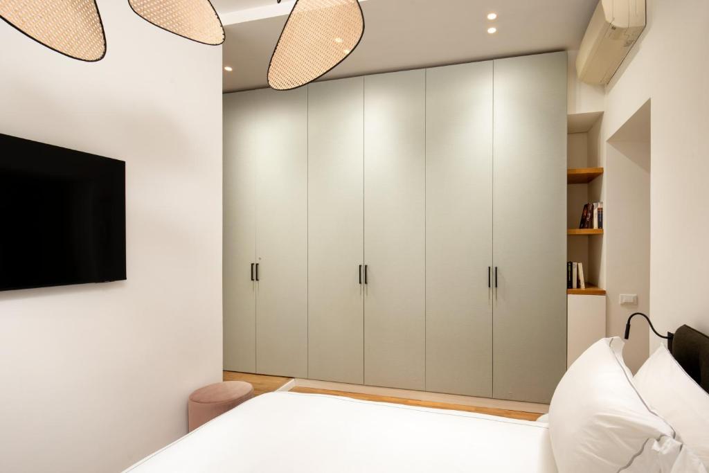 Postel nebo postele na pokoji v ubytování Casavignoni luxury apartment near to Spanish step