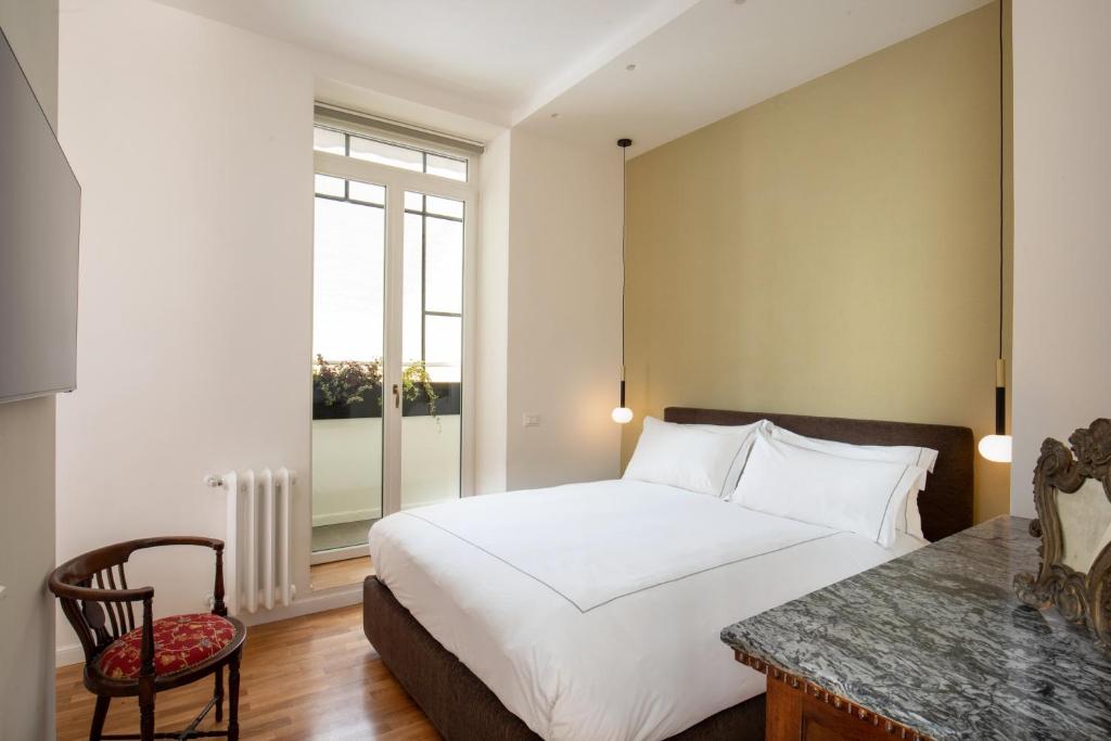 Postel nebo postele na pokoji v ubytování Casavignoni luxury apartment near to Spanish step