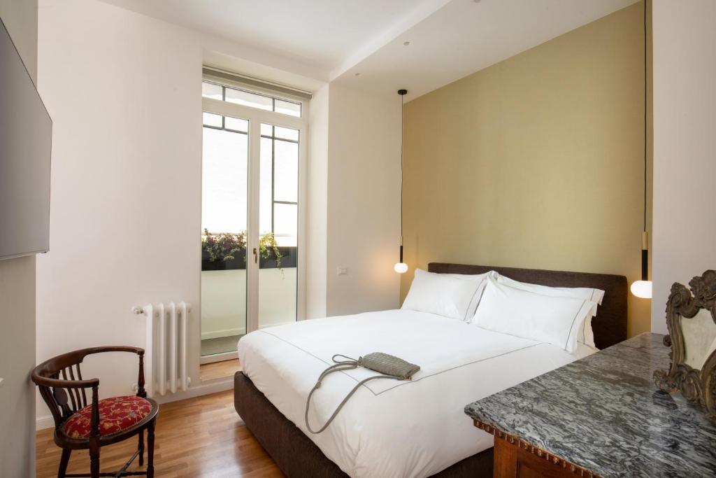 Postel nebo postele na pokoji v ubytování Casavignoni luxury apartment near to Spanish step