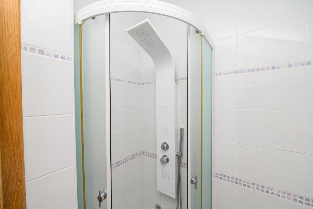 Kúpeľňa v ubytovaní Apartmani Loreta