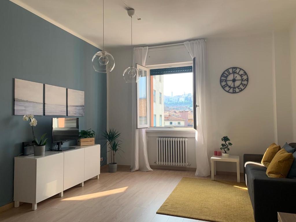 Część wypoczynkowa w obiekcie Camozzi Central Apartment