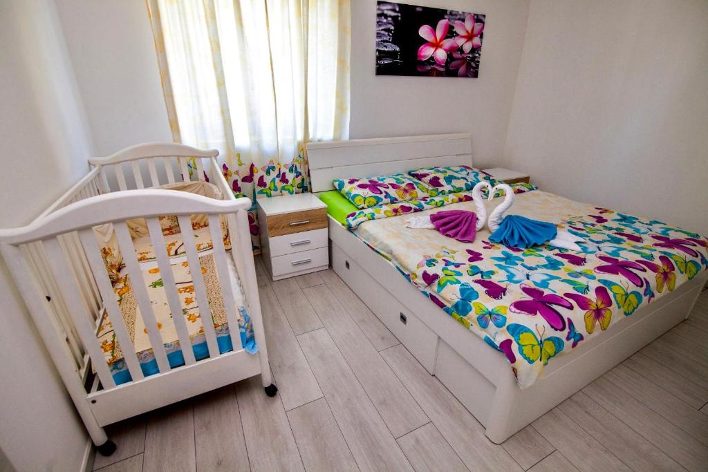 Postel nebo postele na pokoji v ubytování Villa Anita