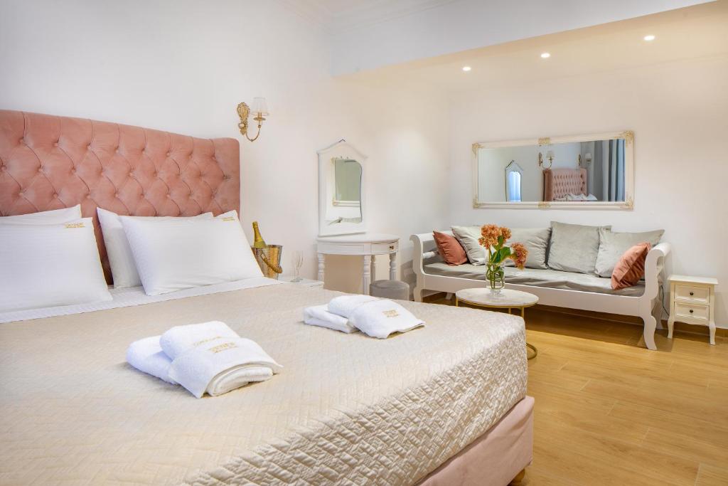 Łóżko lub łóżka w pokoju w obiekcie Vener Luxury Suites