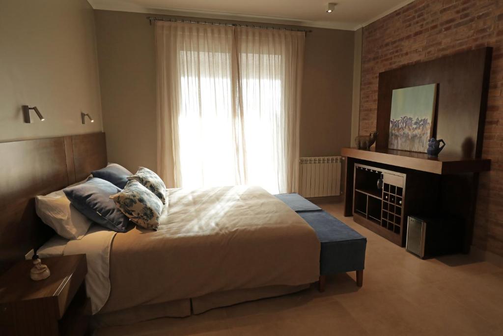 Postel nebo postele na pokoji v ubytování Gaia Lodge