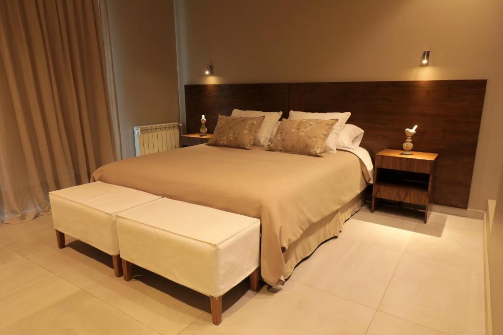 Postel nebo postele na pokoji v ubytování Gaia Lodge
