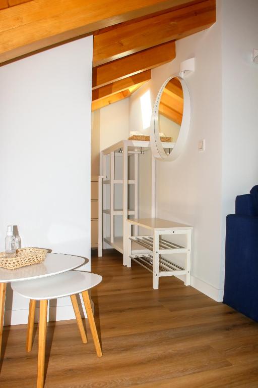 A bed or beds in a room at Apartamentos Mundaka Surf Camp