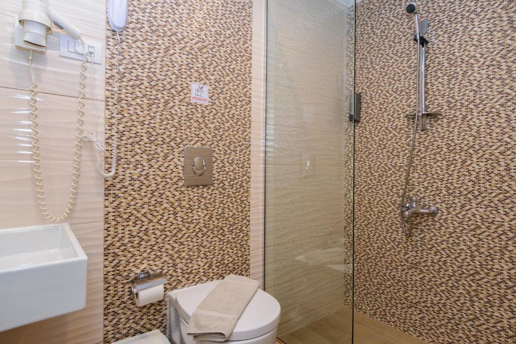 Koupelna v ubytování Archontiki City Hotel