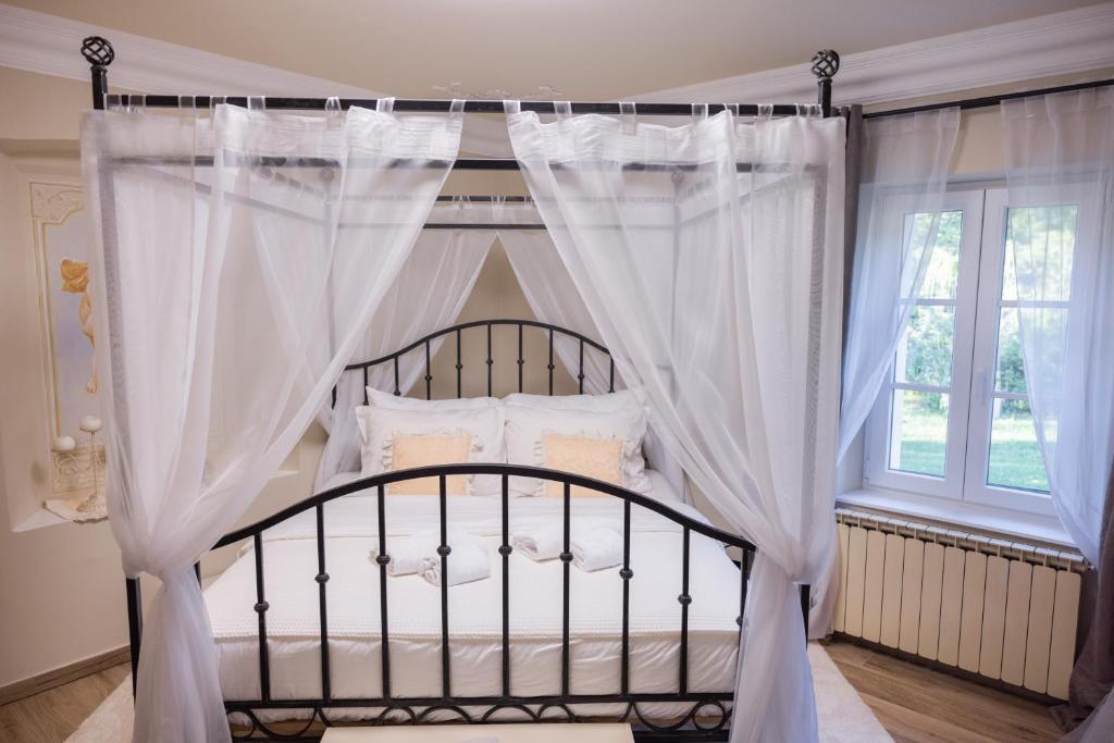 Postel nebo postele na pokoji v ubytování Villa Xaxat